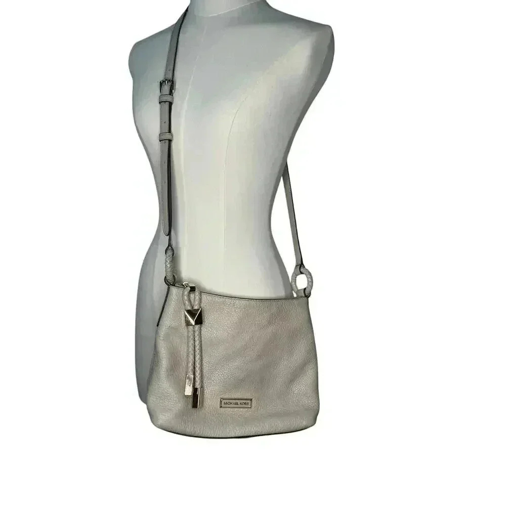 Michael Kors pebble leather tassel crossbody bag